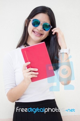 Portrait Of Thai Teen Beautiful Girl Reading Book Stock Photo