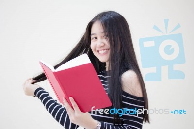 Portrait Of Thai Teen Beautiful Girl Reading Book Stock Photo