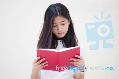 Portrait Of Thai Teen Beautiful Girl Reading Book Stock Photo