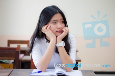 Portrait Of Thai Teen Beautiful Girl Writing Book Stock Photo