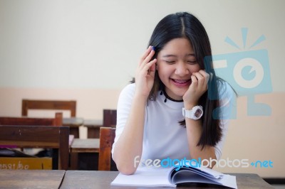 Portrait Of Thai Teen Beautiful Girl Writing Book Stock Photo