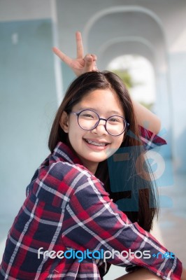 Portrait Of Thai Teen Glasses Beautiful Girl Relax And Smile Stock Photo