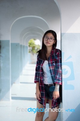 Portrait Of Thai Teen Glasses Beautiful Girl Relax And Smile Stock Photo