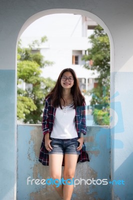 Portrait Of Thai Teen Glasses Beautiful Girl Relax And Smile Stock Photo