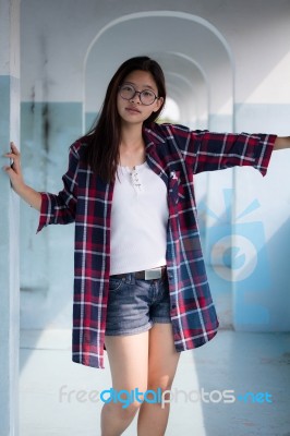 Portrait Of Thai Teen Glasses Beautiful Girl Relax And Smile Stock Photo