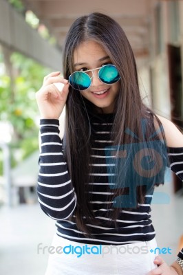 Portrait Of Thai Teen Glasses Beautiful Girl Relax And Smile Stock Photo