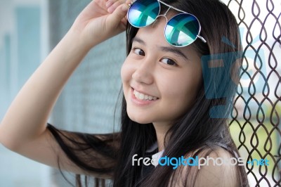 Portrait Of Thai Teen Glasses Beautiful Girl Relax And Smile Stock Photo