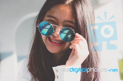 Portrait Of Thai Teen Glasses Beautiful Girl Relax And Smile Stock Photo