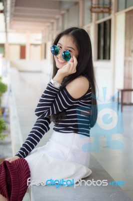 Portrait Of Thai Teen Glasses Beautiful Girl Relax And Smile Stock Photo