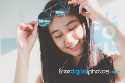 Portrait Of Thai Teen Glasses Beautiful Girl Relax And Smile Stock Photo