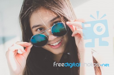 Portrait Of Thai Teen Glasses Beautiful Girl Relax And Smile Stock Photo