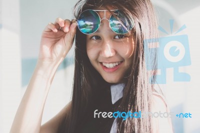 Portrait Of Thai Teen Glasses Beautiful Girl Relax And Smile Stock Photo