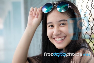 Portrait Of Thai Teen Glasses Beautiful Girl Relax And Smile Stock Photo