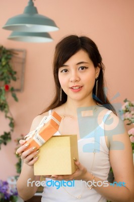 Portrait Of Thai Women Adult Beautiful Girl Hold Gift Box In Hands Stock Photo