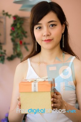 Portrait Of Thai Women Adult Beautiful Girl Hold Gift Box In Hands Stock Photo