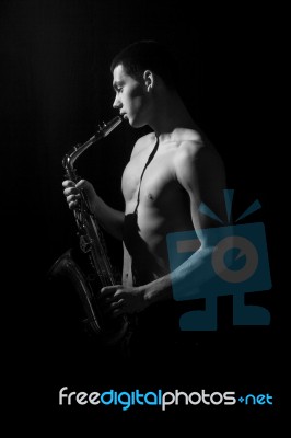 Portrait Of The Men With Saxophone Stock Photo