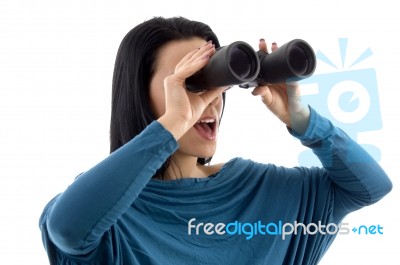 Portrait Of Woman Looking Through Binocular On White Background Stock Photo