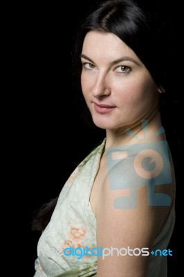 Portrait Of Women With Black Hair And Pattern Shirt Stock Photo