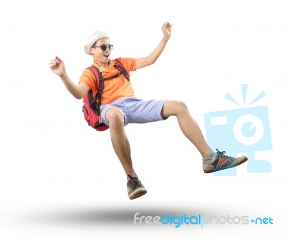 Portrait Of Young Asian Traveler Man Floating Mid Air With Crazy… Stock Photo