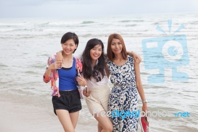 Portrait Of Young Beautiful Asian Woman Friend Relaxing Happy Emotion On Sea Beach Vacation Holiday Stock Photo