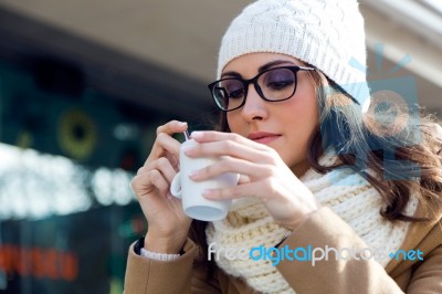 Portrait Of Young Beautiful Woman Drinking Coffee Outdoor Stock Photo