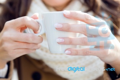 Portrait Of Young Beautiful Woman Drinking Coffee Outdoor Stock Photo