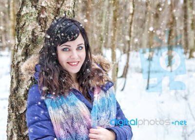 Portrait Of Young Beautiful Woman Walking In The Woods Stock Photo