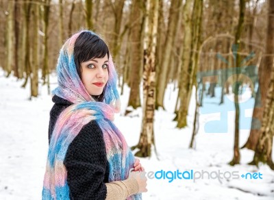 Portrait Of Young Beautiful Woman Walking In The Woods Stock Photo