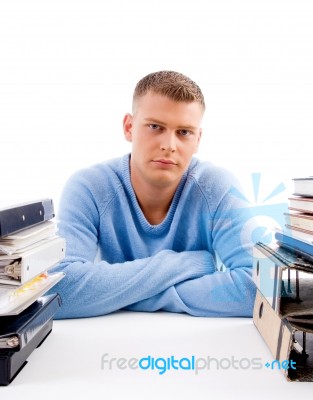 Portrait Of Young Professional Sitting In An Office Stock Photo