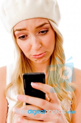 Portrait Of Young Woman Looking The Cell Phone Stock Photo