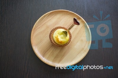 Portuguese Egg Tart On A Wood Dish With White Greeting  Blank Paper Stock Photo