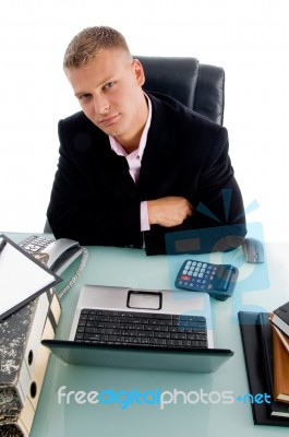 Posing Young Ceo with laptop Stock Photo