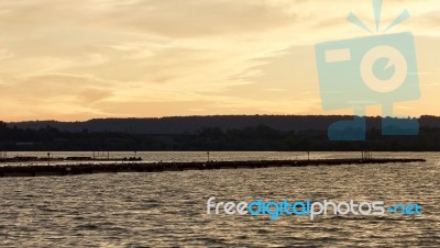 Postcard With An Amazing Sunset On A Lake Stock Photo