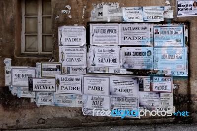 Posters On A Wall In Arzachena Stock Photo