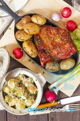 Potato Salad And Bacon Rib With Roasted Potatoes. Farmhouse Styl… Stock Photo