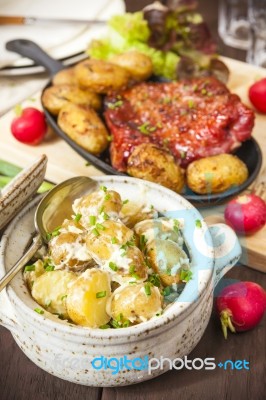 Potato Salad And Bacon Rib With Roasted Potatoes. Farmhouse Styl… Stock Photo