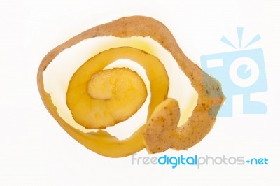 Potato Skin Pealing Process On A White Background Stock Photo