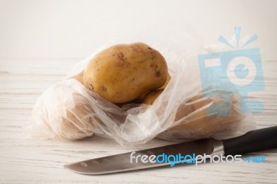 Potato Still Life On Wood Background Stock Photo