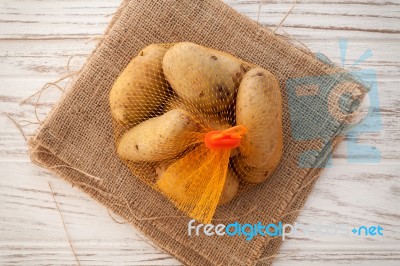 Potato Still Life On Wood Background Stock Photo