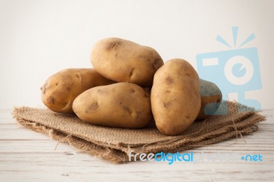 Potato Still Life On Wood Background Stock Photo