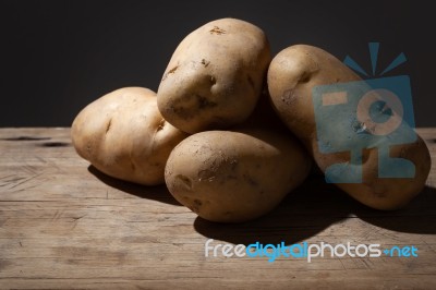 Potato Still Life On Wood Background Stock Photo