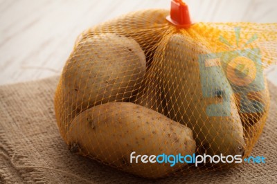 Potato Still Life On Wood Background Stock Photo