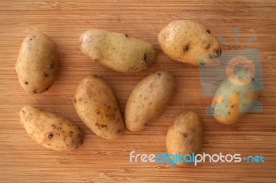 Potato Still Life On Wood Background Flat Lay Stock Photo