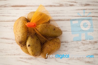 Potato Still Life On Wood Background Flat Lay Stock Photo