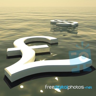 Pound And Dollar Floating In Sea Stock Image