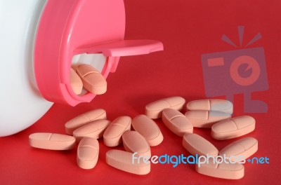 Pour Pills Stock Photo