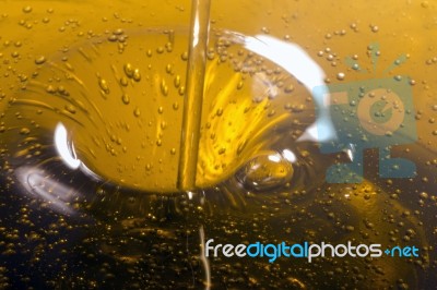 Pouring Olive Oil Liquid Stock Photo