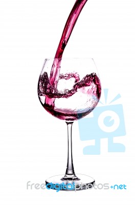 Pouring Red Wine Isolated On White Background Stock Photo