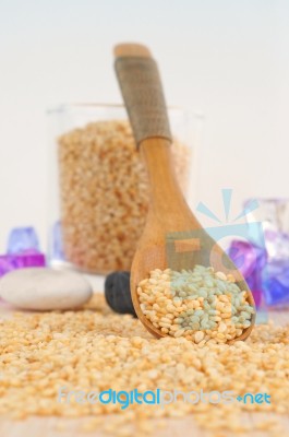 Pouring Sesame From Wooden Spoon Stock Photo