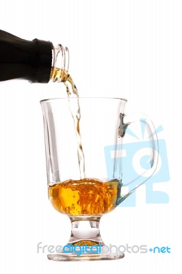 Pouring Whisky Into Glass Stock Photo